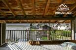 Discover the charm of this property, featuring a rustic wooden ceiling and a balcony offering stunning views.