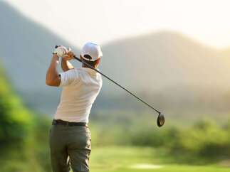 Enjoy the serene beauty of this golf course, perfect for a relaxing day out.