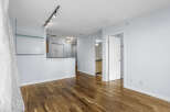 Step into modern elegance with this stunning property featuring beautiful hardwood floors and a bright, open layout.