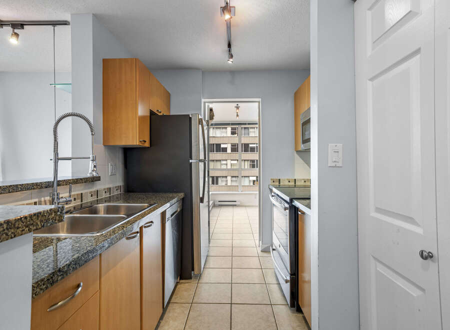 This stunning kitchen boasts modern appliances and ample counter space, perfect for culinary enthusiasts.
