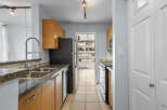 This stunning kitchen boasts modern appliances and ample counter space, perfect for culinary enthusiasts.