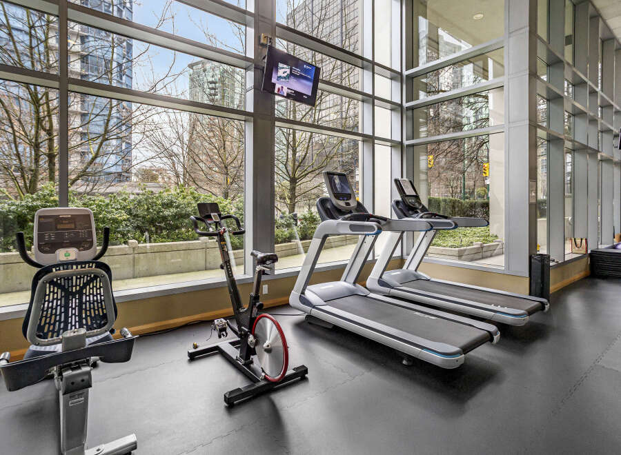 This modern fitness center offers a bright and airy space for your workout routine.
