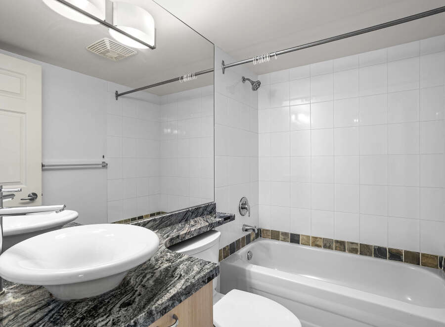Step into a modern bathroom with sleek design elements.