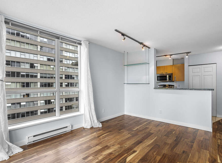 Discover modern living in this stunning condo featuring a bright, open layout with beautiful hardwood floors.