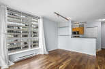 Discover modern living in this stunning condo featuring a bright, open layout with beautiful hardwood floors.