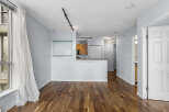This stunning property boasts a modern open-concept design with beautiful hardwood floors throughout.