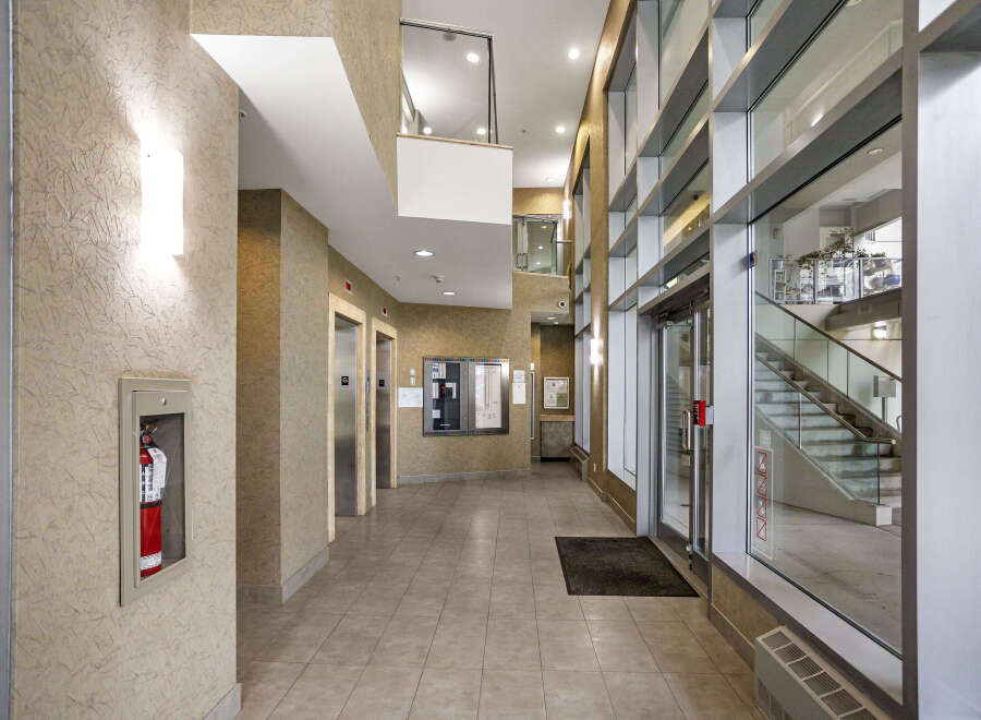 Step into a modern and well-maintained building entrance.