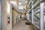 Step into a modern and well-maintained building entrance.