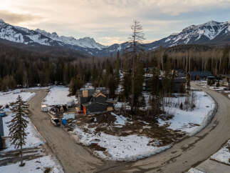 Nestled amidst the stunning backdrop of snow-capped mountains and lush forests, this property offers a unique blend of natural beauty and modern living.