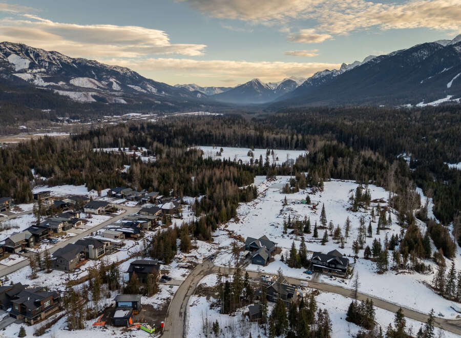 Discover your dream home in this stunning mountain community! This property boasts modern architecture, spacious interiors, and breathtaking views of the surrounding snow-capped mountains.