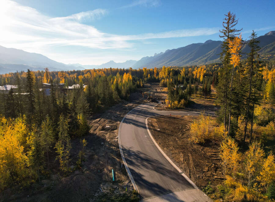 Discover the beauty of this stunning property surrounded by vibrant fall foliage.