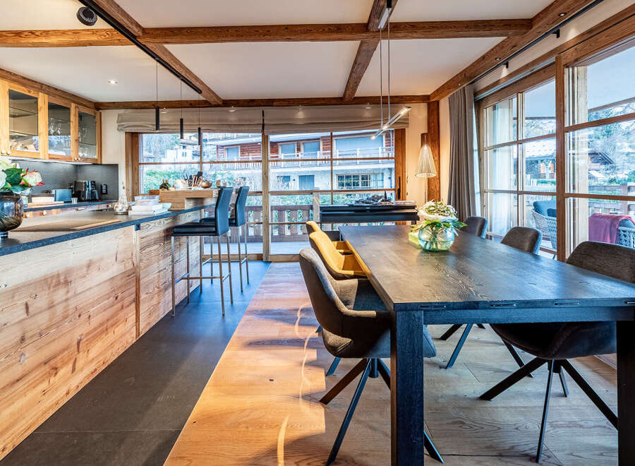 Experience the epitome of luxury living in this stunning property, featuring a beautifully designed kitchen with custom cabinetry and a sleek countertop.