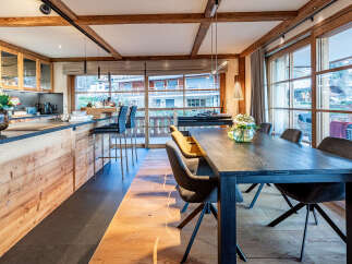 Experience the epitome of luxury living in this stunning property, featuring a beautifully designed kitchen with custom cabinetry and a sleek countertop.