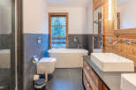 Experience luxury in this stunning bathroom featuring a modern design and high-end finishes.