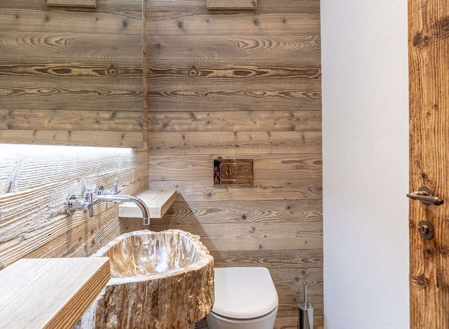 Experience rustic elegance in this stunning bathroom.