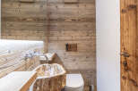 Experience rustic elegance in this stunning bathroom.