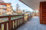 Enjoy breathtaking mountain views from this stunning balcony.