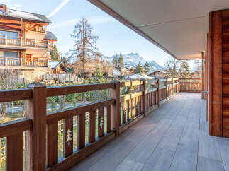 Enjoy breathtaking mountain views from this stunning balcony.