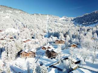 Discover a winter wonderland in this stunning property nestled in the heart of the mountains.