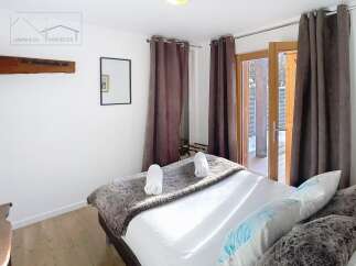 Discover the charm of this cozy bedroom, perfect for a relaxing retreat.
