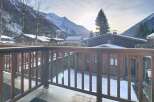 Enjoy breathtaking mountain views from this charming property.