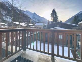 Enjoy breathtaking mountain views from this charming property.