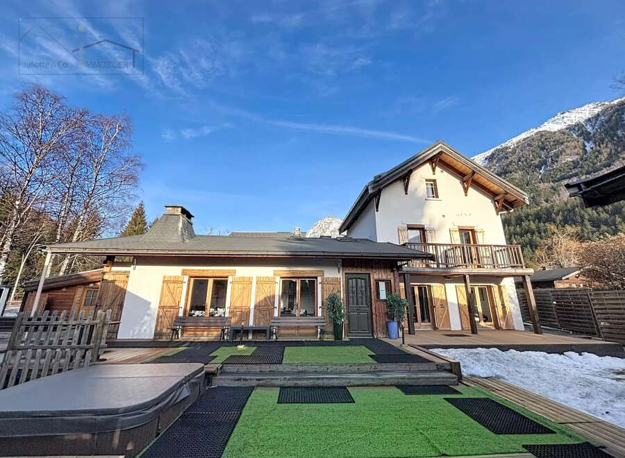 Discover the charm of this stunning property, featuring a beautiful house with wooden shutters and a balcony.