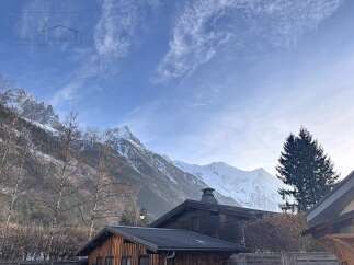 Nestled amidst the majestic snow-capped mountains, this charming property offers a serene escape.