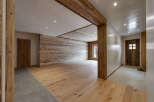 This stunning property boasts a rustic charm with its wooden accents and inviting atmosphere.