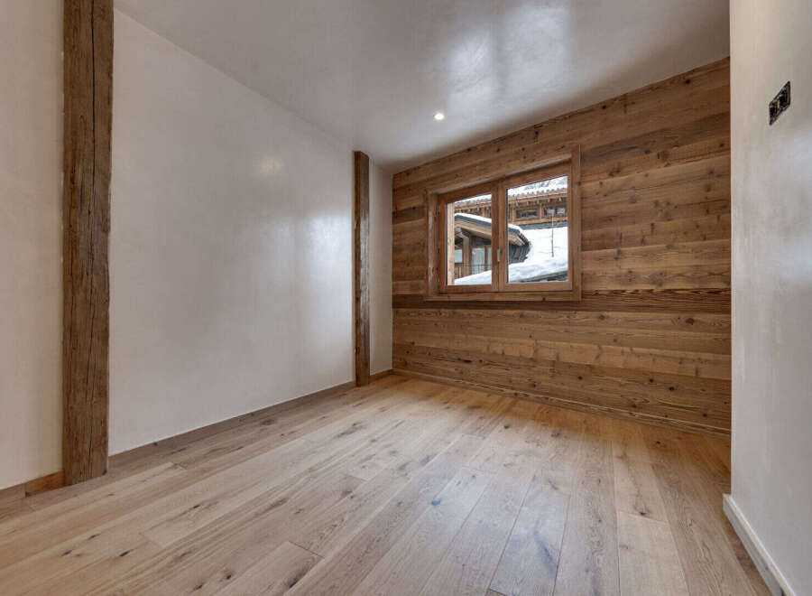 This stunning room features a beautiful combination of natural wood elements and modern design.