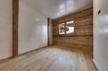 This stunning room features a beautiful combination of natural wood elements and modern design.