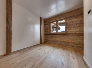 This stunning room features a beautiful combination of natural wood elements and modern design.