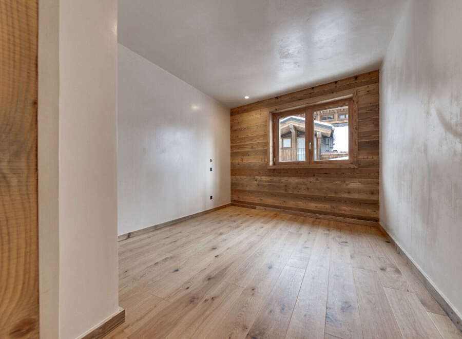This stunning room boasts a warm and inviting atmosphere, perfect for relaxation.