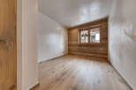 This stunning room boasts a warm and inviting atmosphere, perfect for relaxation.