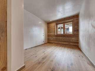 This stunning room boasts a warm and inviting atmosphere, perfect for relaxation.