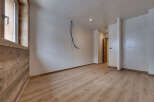Discover the charm of this inviting space, featuring beautiful wooden floors and a bright, airy atmosphere.