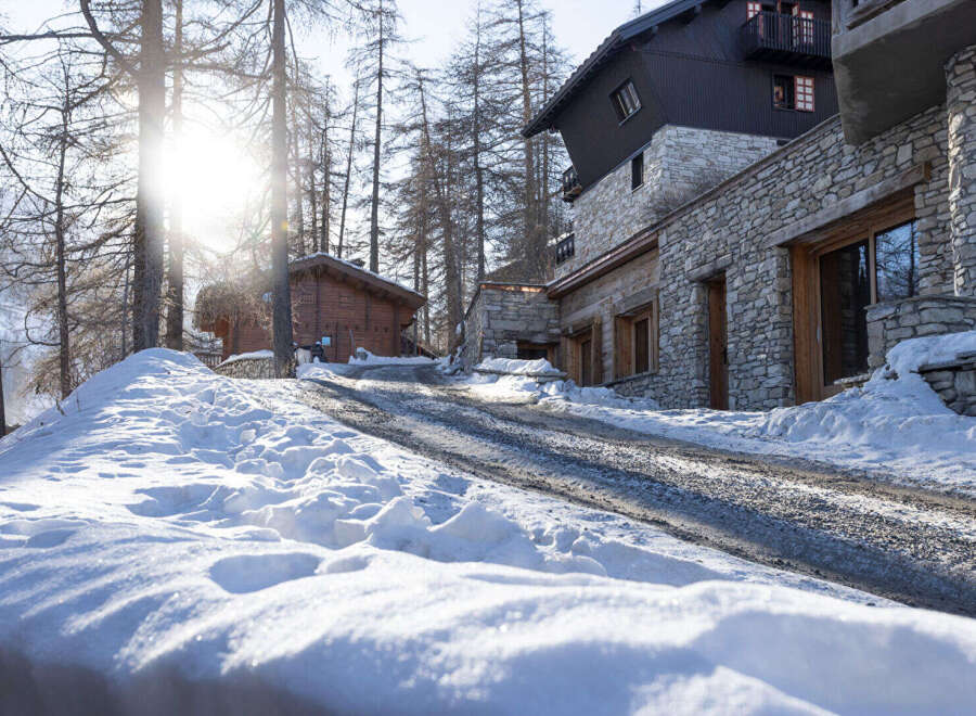 Discover the charm of this stunning mountain property, nestled in a serene winter landscape.