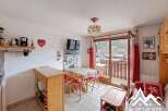 Discover this charming apartment with a cozy dining area and a balcony offering stunning views.