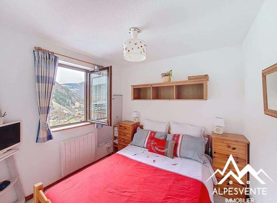 Discover a cozy bedroom with stunning mountain views.