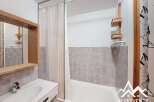 Discover a cozy bathroom with a clean and inviting atmosphere.