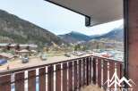 Enjoy breathtaking mountain views from this charming property.