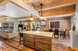 This stunning property boasts a warm and inviting interior with a rustic charm.
