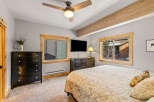 This cozy bedroom features a comfortable bed, perfect for relaxing after a long day.