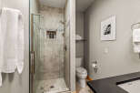 Step into a modern bathroom oasis with this stunning design.