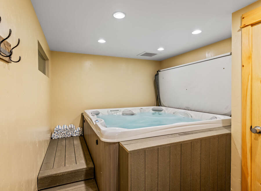 Relax and unwind in this luxurious hot tub, perfect for a spa-like experience in the comfort of your own home.