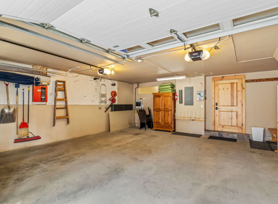 This spacious garage offers ample room for parking and storage.