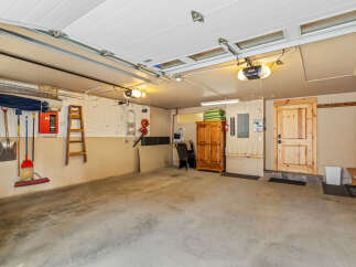This spacious garage offers ample room for parking and storage.