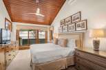 Step into luxury with this stunning bedroom featuring a cozy king-sized bed and elegant decor.