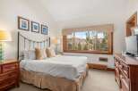 This stunning bedroom offers a serene retreat with its elegant design and breathtaking views.