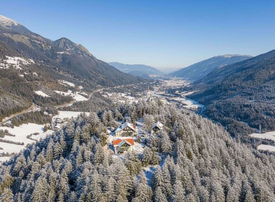 Nestled amidst the snow-kissed peaks, this stunning property offers unparalleled views and a serene escape.